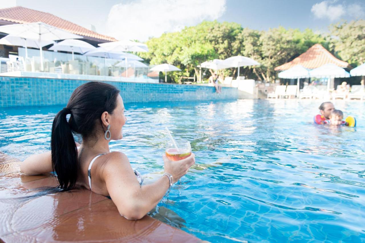 The Capital Zimbali Ballito Exterior foto A woman relaxing at a pool