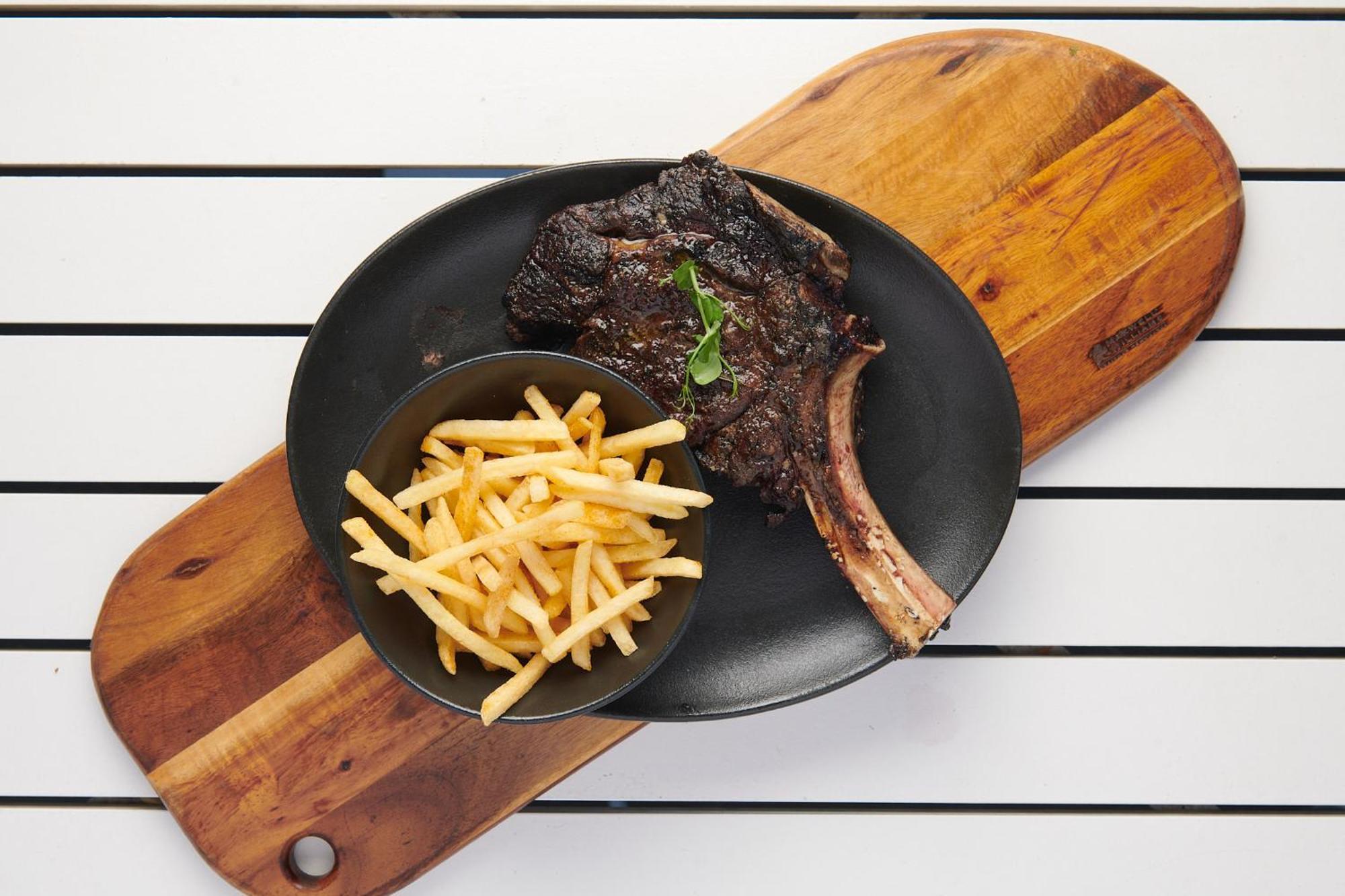The Capital Zimbali Ballito Exterior foto A steak and chips meal