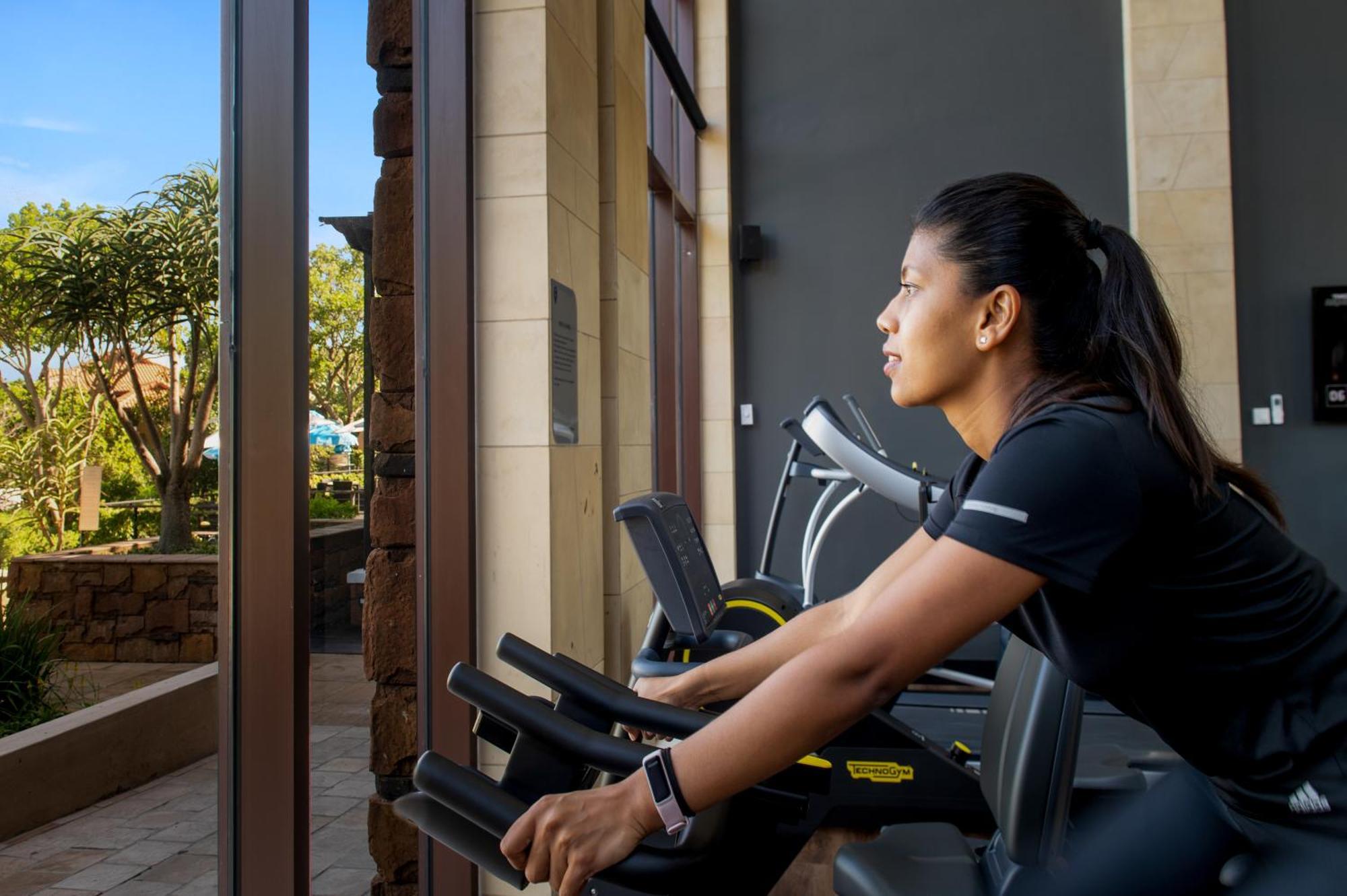 The Capital Zimbali Ballito Exterior foto A woman on a treadmill